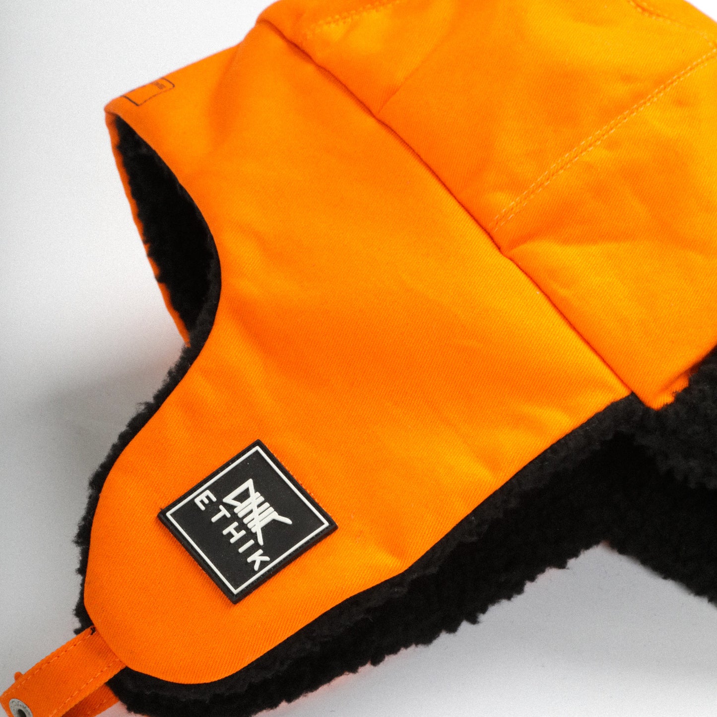 International Trapper Cap | Orange